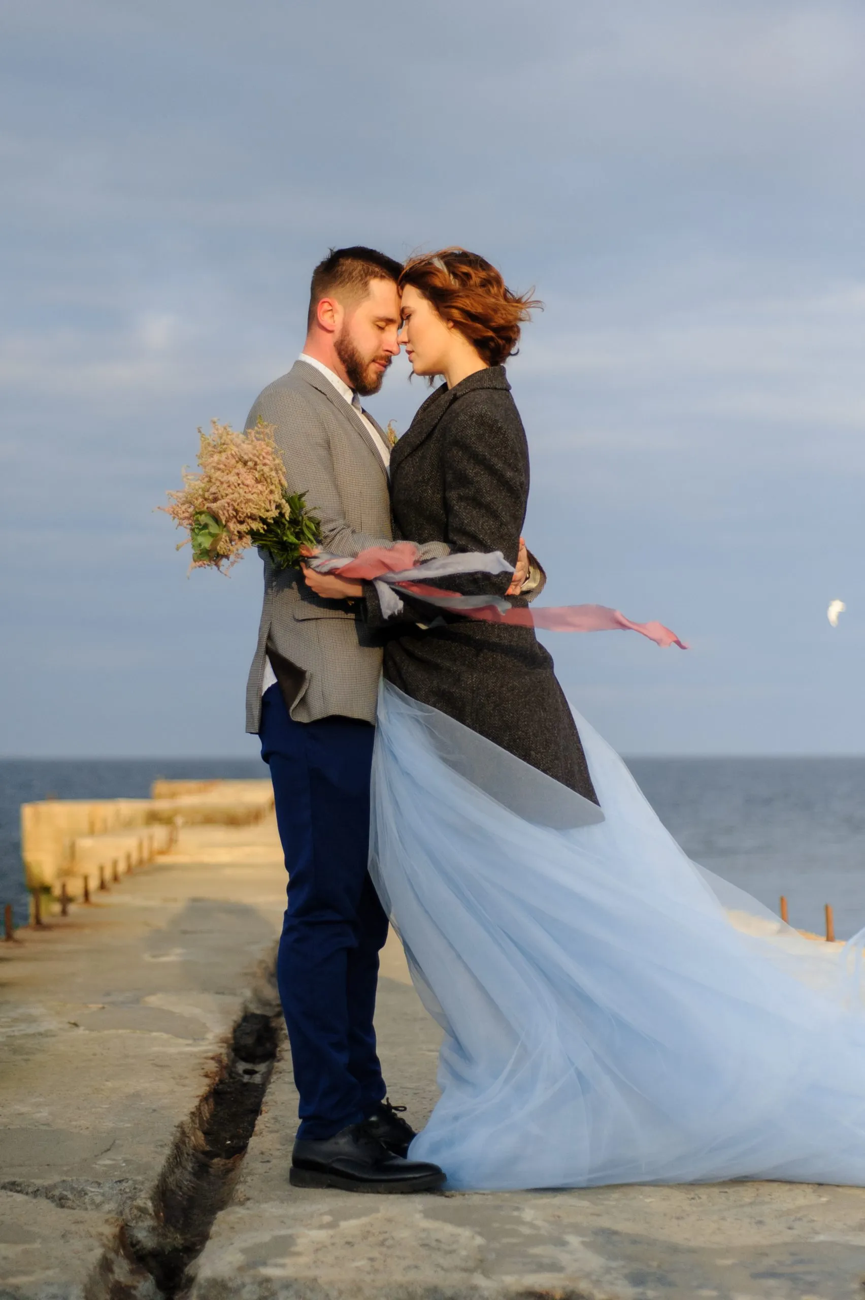 wedding-photo-session-of-a-couple-on-the-seashore-2021-09-01-01-22-42-utc