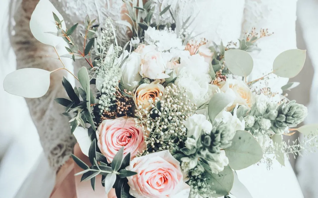 Beautiful bride holding flower bouquet, wedding aesthetic