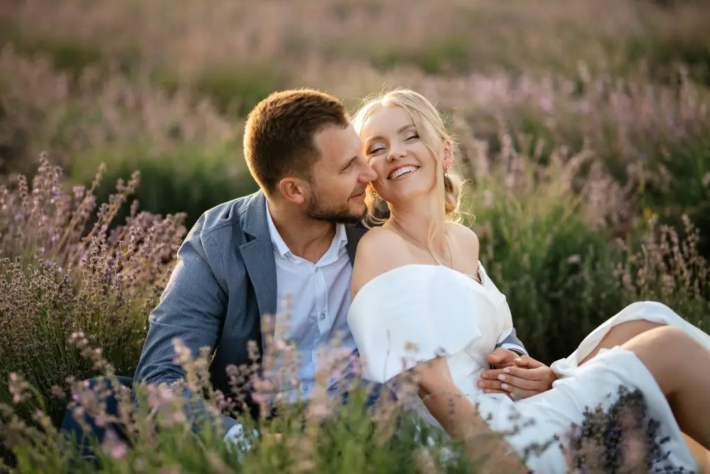 bride and groom on in the lavender field