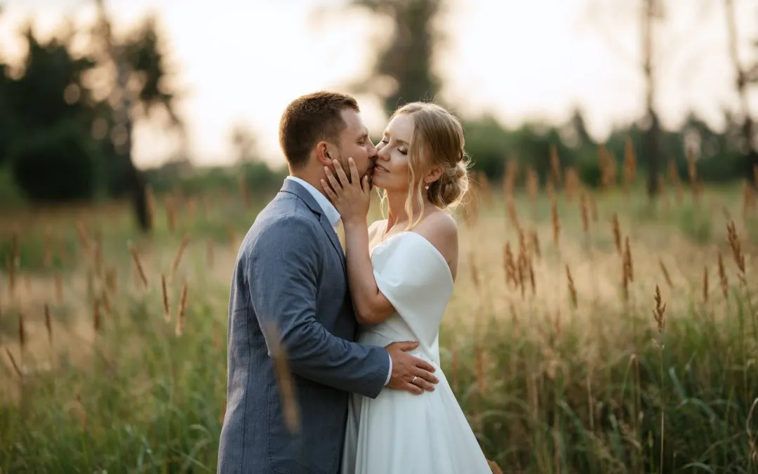 bride and groom on in the woods