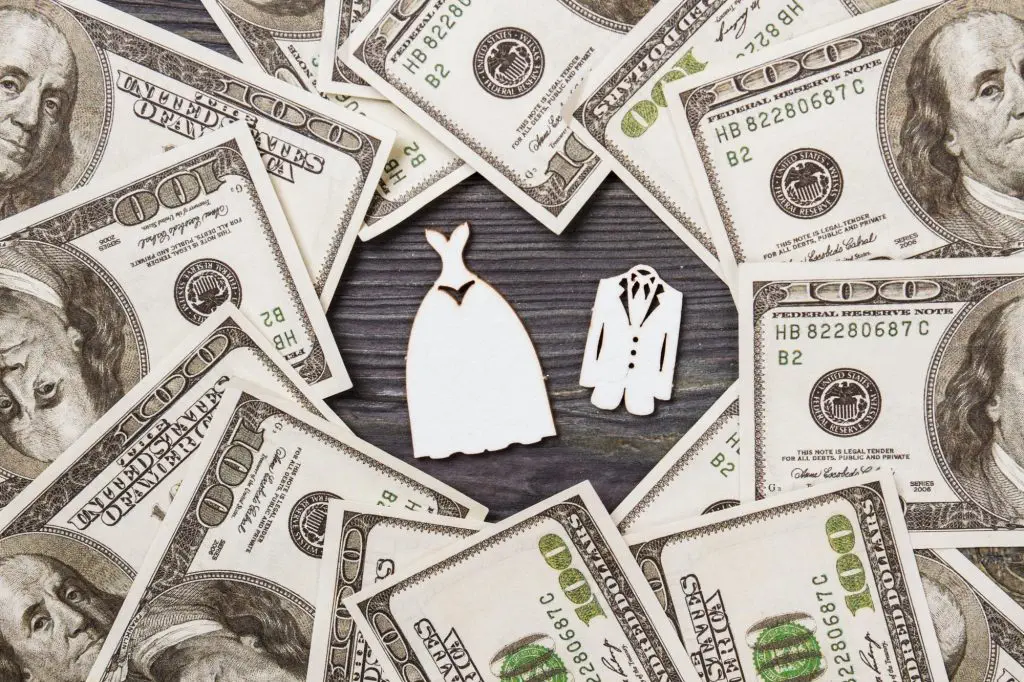 Dollars cash frame and wedding costumes.