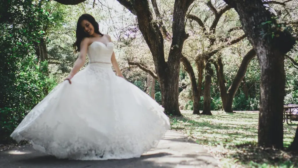 Woman on a wedding dress taking her bridal pictures