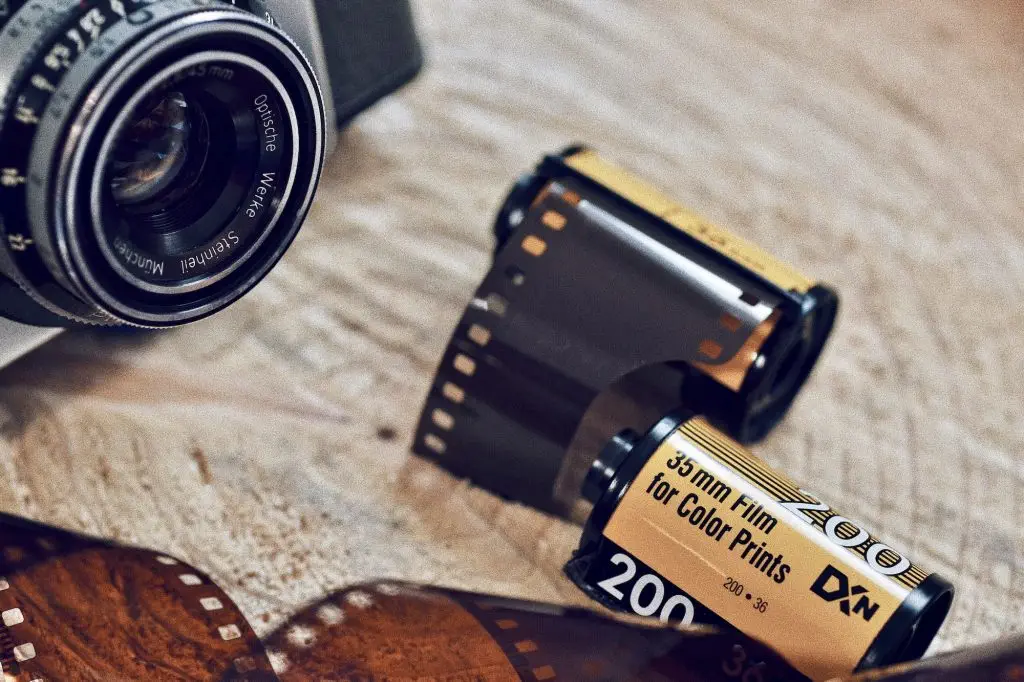 35mm film rolls and a vintage camera
