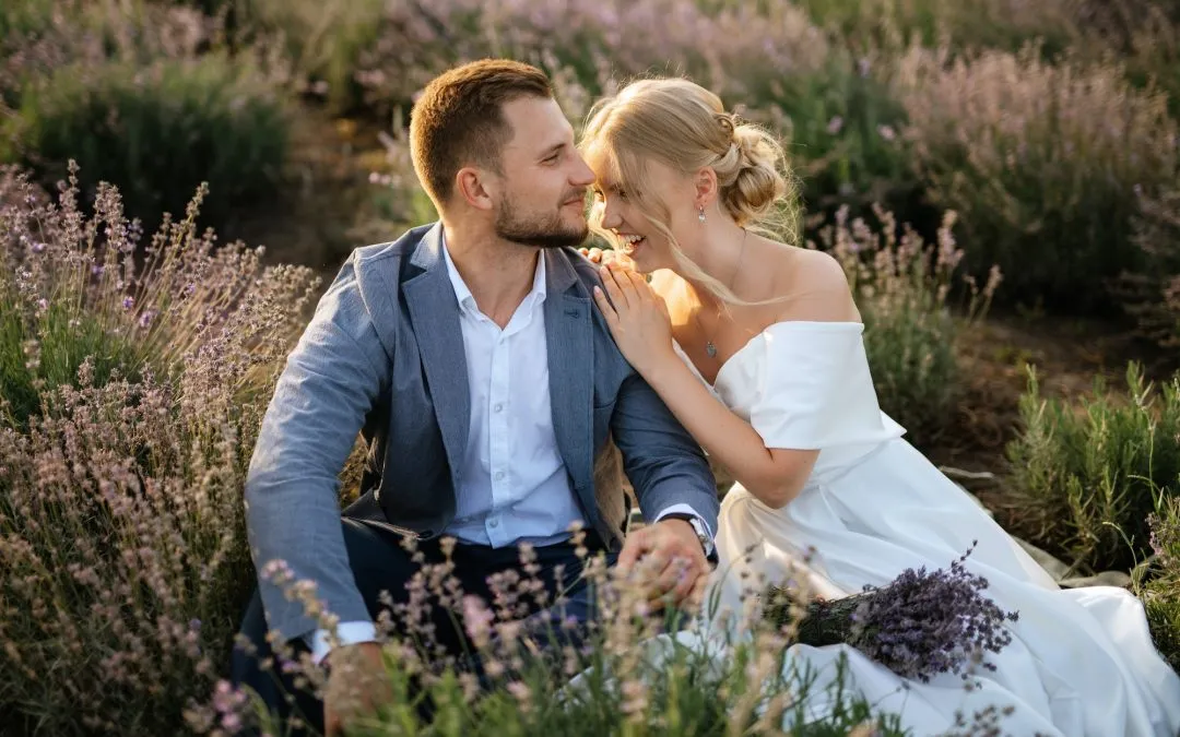 bride and groom on in the lavender field