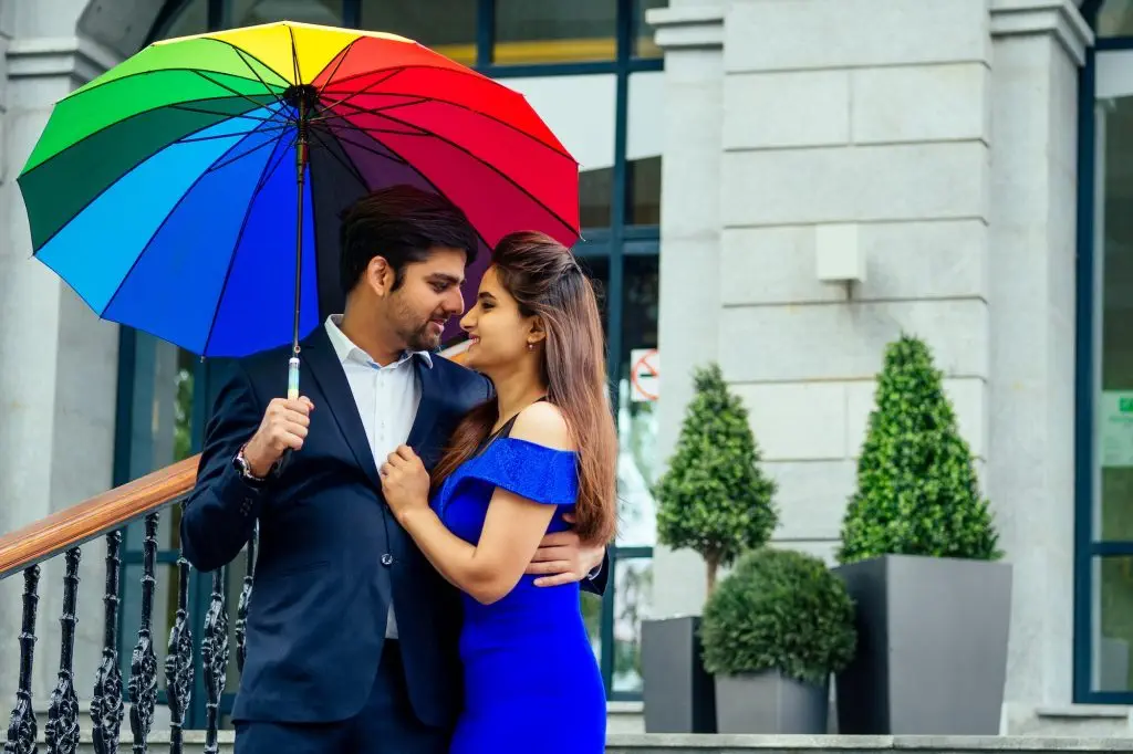 indian woman in long evening blue dress spinding romantic time together
