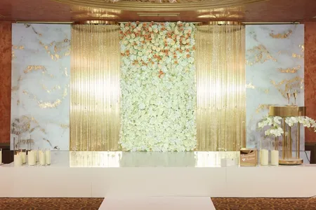 An arch for a wedding ceremony in a restaurant