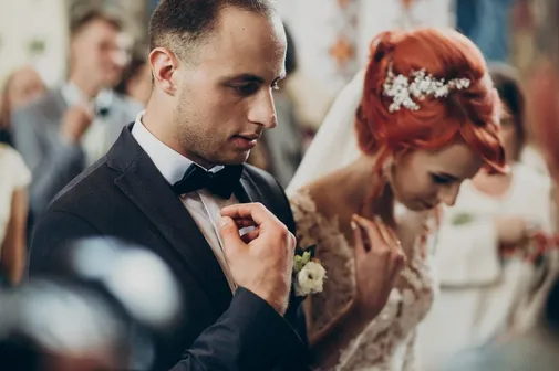 Wedding couple at matrimony wedding ceremony in church