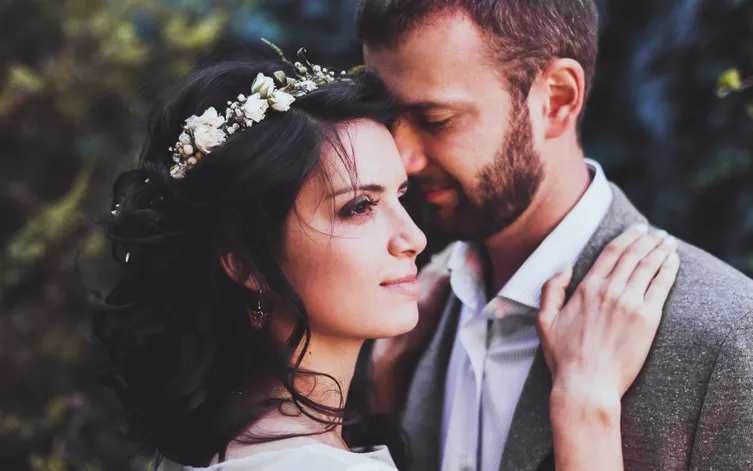 Sensual portrait of couple close-up. Wedding photography in rustic style