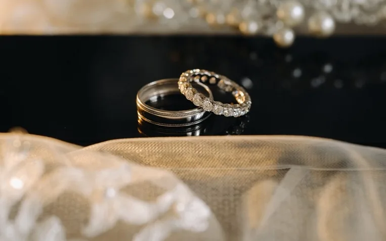 A pair of gold wedding rings.Two wedding rings